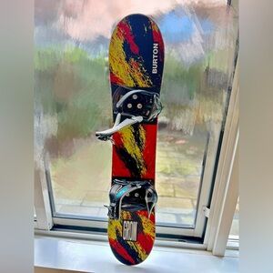Burton Grom Snowboard with Vibrant Black and Red Pattern